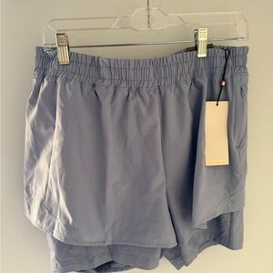 CALIA by Carrie Underwood Women's Athletic Shorts in Soft Blue
